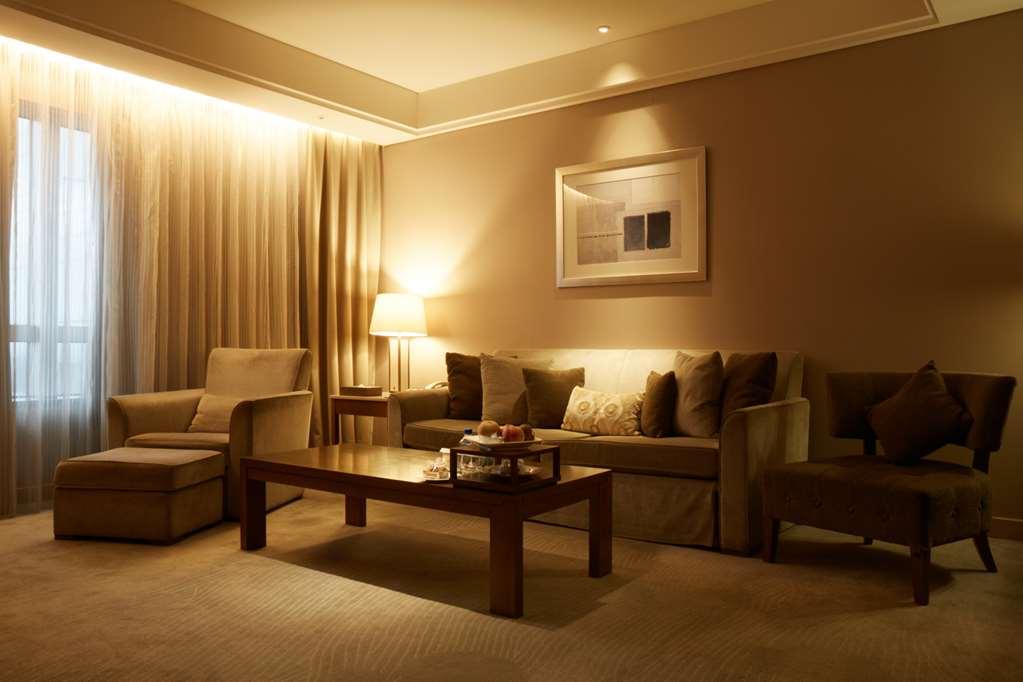 Windsor Hotel Taichung Room photo A living room with indirect lighting