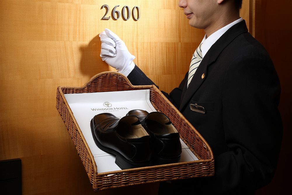 Windsor Hotel Taichung Exterior photo A bellboy delivering shoes to a guest